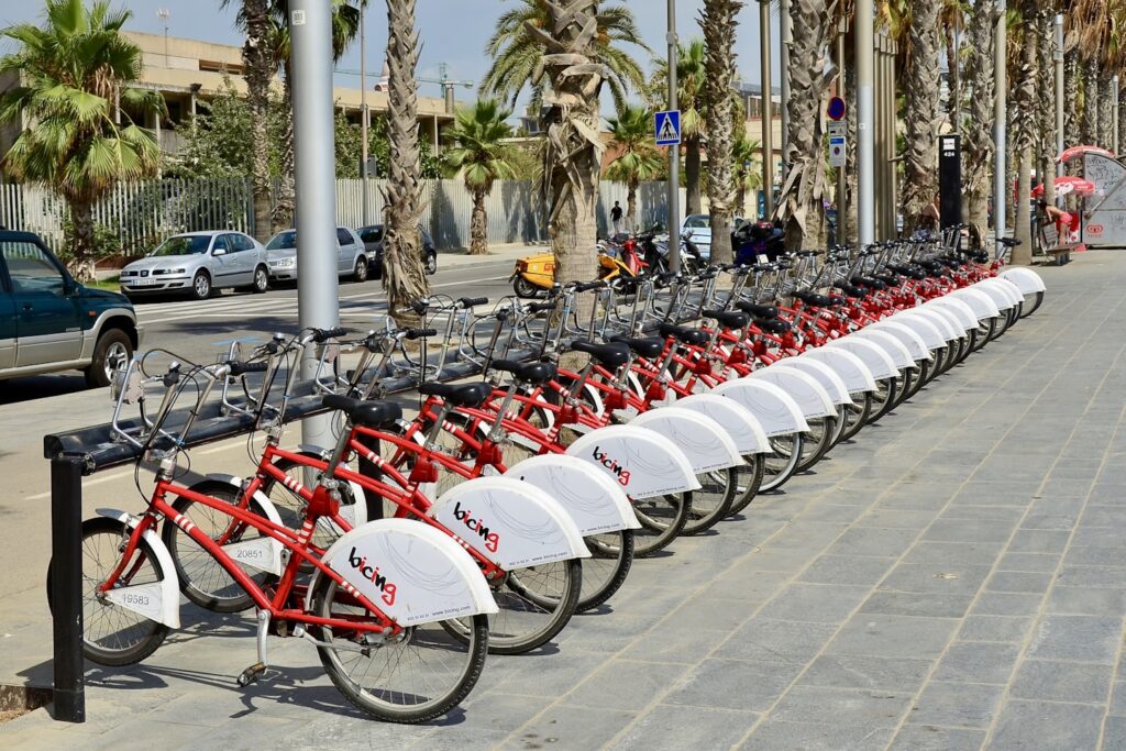 Bike-sharing station in Barcelona near the beach.